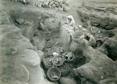 Garstang recording excavated Middle Bronze Age (2000-1500 BC) store rooms by English Photographer